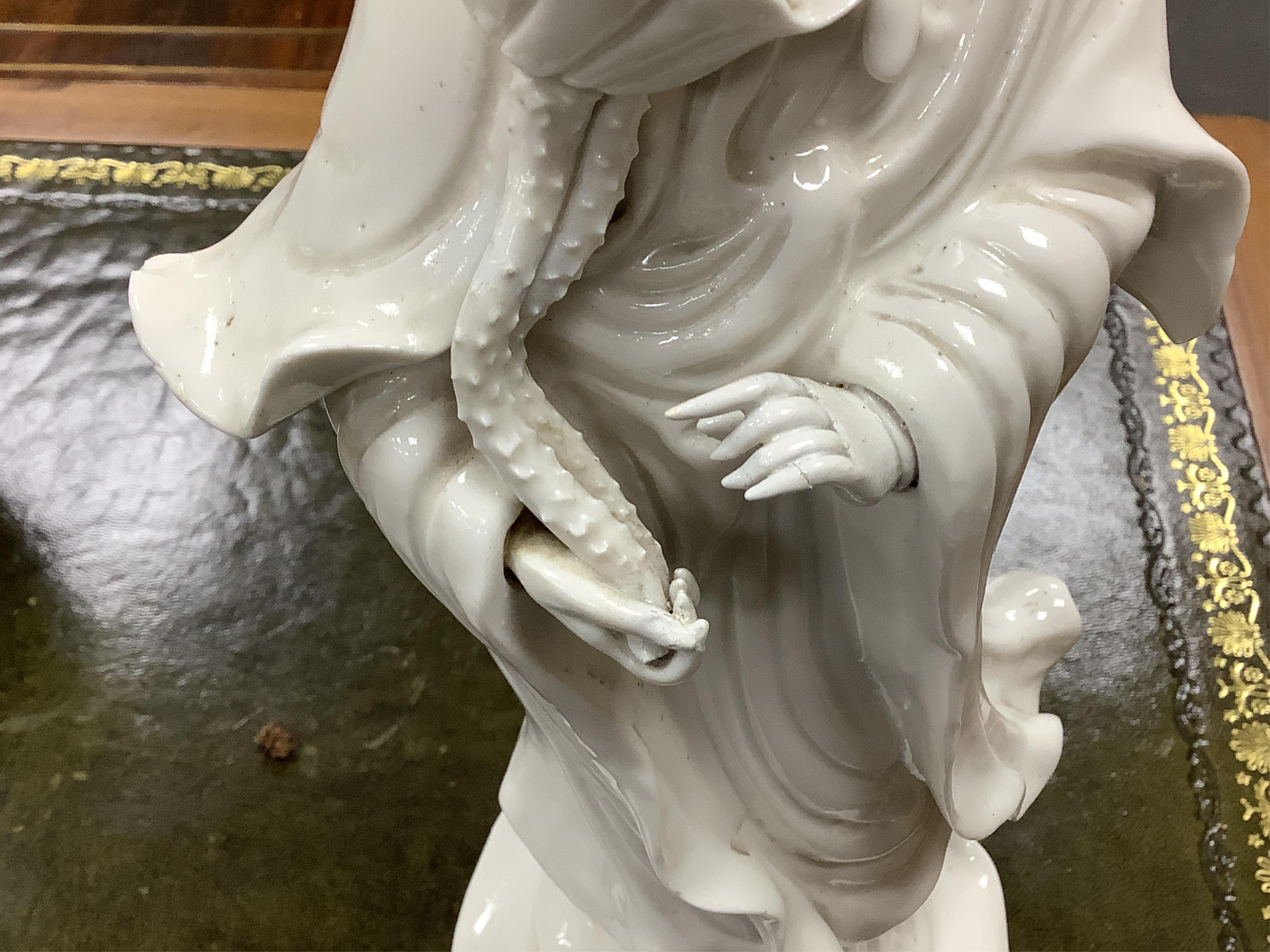 A Chinese blanc de chine figure of Guanyin, 42cm high